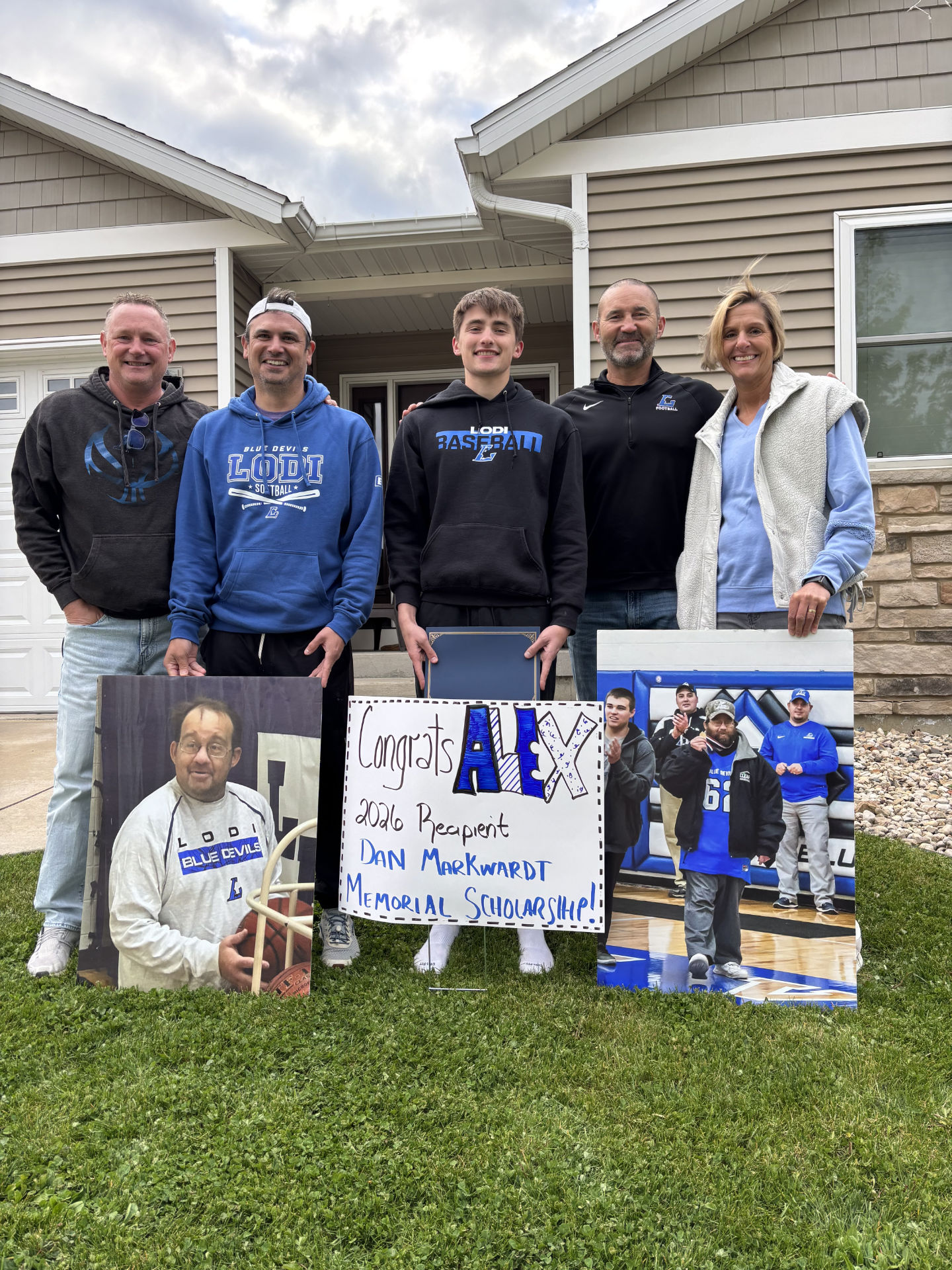 Alex with members of the DMMF Board. Left to Right: Mitch Hauser, Geoff Lorenz, Alex Breunig, Dave Puls, and Michelle Puls.